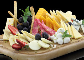 Gourmet cheese and fruit platter prepared by FoodByWayne