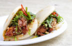 Mini bao bun with spiced chicken and Asian salad Mini Bao bun with spiced prepared by FoodByWayne
