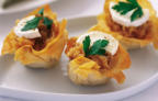 Caramelized onion and goat cheese tarts prepared by FoodByWayne