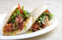 Mini bao bun with spiced chicken and Asian salad Mini Bao bun with spiced prepared by FoodByWayne